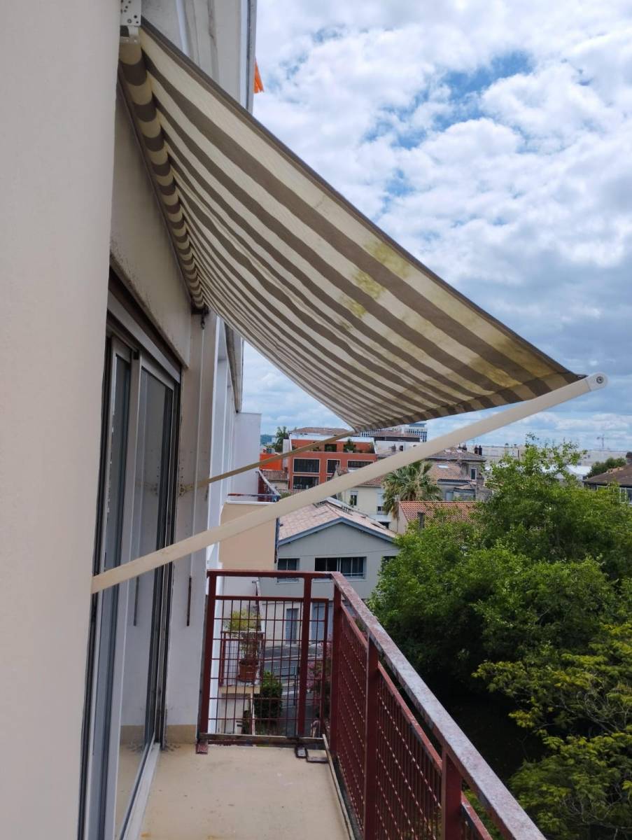 Remplacement axe volet roulant par volet électrique bordeaux